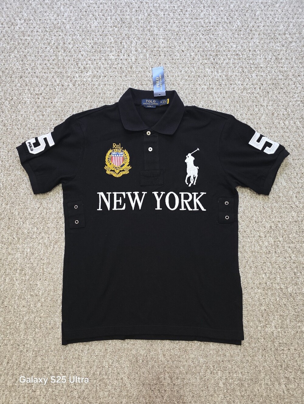 Polo with White Embroidery and Gold Crest